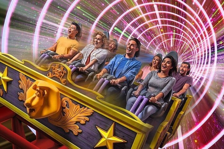 Experience the joy of laughter and excitement as you soar through exhilarating rides at Dubai Parks and Resorts creating unforgettable memories with family and friends in a magical setting.